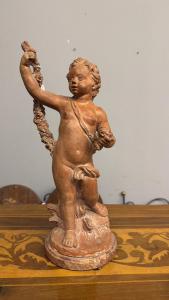 Antique sculpture of a cherubic figure in terracotta, late 18th century France, h35 cm